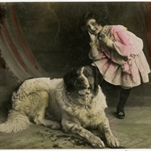 Young French girl with a huge St Bernard Dog