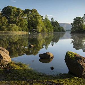 Beautiful morning on a reflection Derwent Water in the Lake District National Park