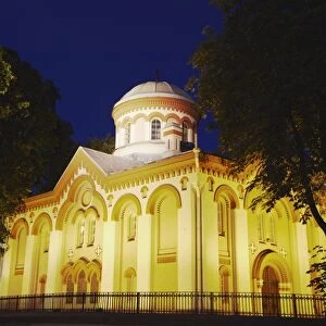 Illuminated church on Pilies Gatve, Vilnius, Lithuania, Baltic States, Europe