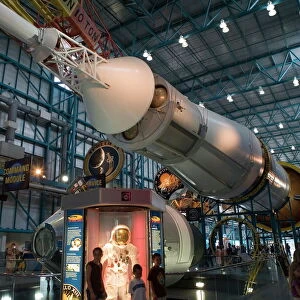 Saturn V rocket, Command and Service modules, and a space suit from Apollo 13