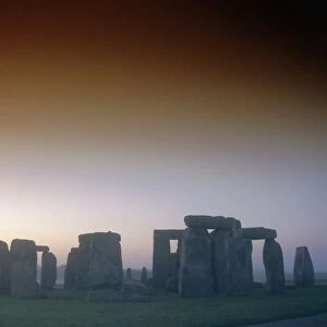Standing stone circle at sunrise, Stonehenge, Wiltshire, England, UK, Europe