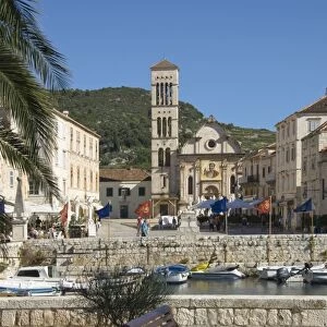 View from the old harbour across the main square to St. Stephens Cathedral, in the medieval city of Hvar, island of Hvar, Dalmatia, Croatia, Europe