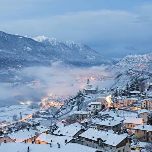 Dawn on the village of Poggiridenti after an snowy night, Province of Sondrio, Valtellina