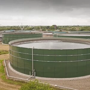 Waste water tanks at Daveyhulme wastewater treatment plant in Manchester, UK. United Utilities Daveyhulme plant processs all of Manchester sewage and deals with 714 million litres a day. The sewage sludge from the plant is put in huge