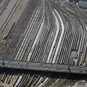 An aerial view shows cars driving over tracks at Austerlitz train station in Paris
