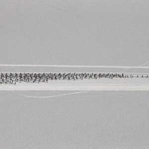 An aerial view shows cross country skiers racing over the frozen Lake Silsersee during