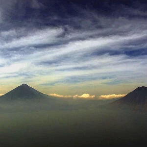 AERIAL VIEW SHOWS THE PANAJACHEL VOLCANOS AFTER SUNSET
