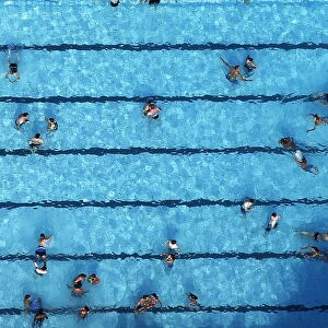 An aerial view shows people at a swimming pool on a hot summer day in Haltern