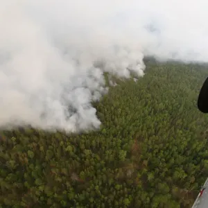 An aerial view shows the Taiga wood burning near Boguchany An aerial view shows the Taiga wood burning near Boguchany