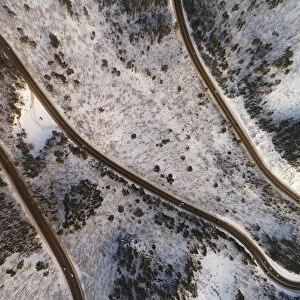 An aerial view shows vehicles driving along the R257 Yenisei federal highway in the