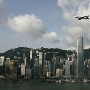 An Airbus A380 flies over Hong Kongs Victoria Harbour in Hong Kong