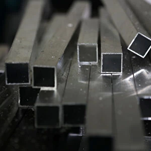 Aluminium bars are seen at Torno Lara Industries in San Salvador