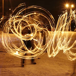 Amateur artists perform a fire show to celebrate the Chinese Lunar New Year in Russia s
