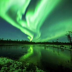 Aurora Borealis is seen over the sky near Rovaniemi in Lapland