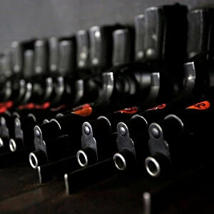 Beretta 9mm pistols are pictured at the police barracks storehouse in Monterrey