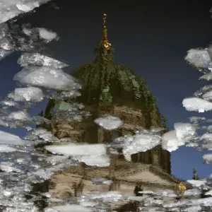The Berlin Cathedral is reflected in Spree river that carries ice floats downstream The Berlin Cathedral is reflected in Spree river that carries ice floats downstream