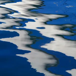 BIGO STRUCTURE REFLECTED IN WATER BY HARBOUR IN GENOA