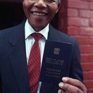 Black nationalist leader Nelson Mandela shows his passport