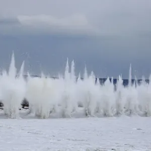 A blast rips through the ice covering the Kan river to reduce the risk of floods A blast rips through the ice covering the Kan river to reduce the risk of floods
