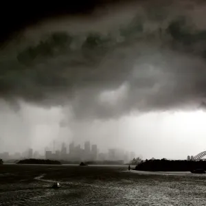 Boats sail on Sydney harbour as a severe storm hits the city Boats sail on Sydney harbour as a severe storm hits the city