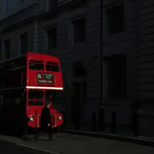 A bus is parked in a street in central London A bus is parked in a street in central London