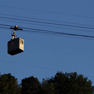A cable car passes above the town of Chiatura