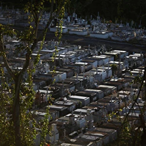 A cemetery is seen in Lares