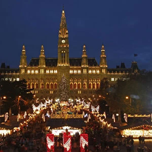 The city hall is pictured behind Christkindlmarkt advent market in Vienna