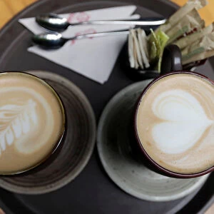 Cups of cappuccino are seen at a Juan Valdez store in Bogota