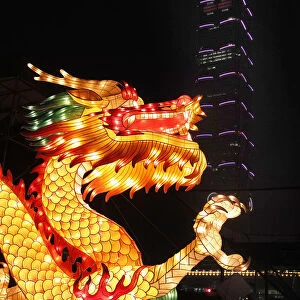 A dragon-shaped lantern is on display in front of Taiwans landmark building Taipei