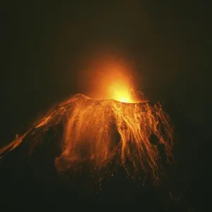 Ecuadors Tungurahua volcano spews volcanic lava accompanied by large clouds of gas Ecuadors Tungurahua volcano spews volcanic lava accompanied by large clouds of gas
