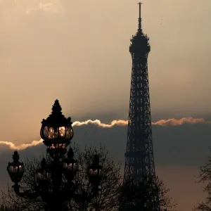 The Eiffel tower is pictured as the sun sets on a winter day in Paris The Eiffel tower is pictured as the sun sets on a winter day in Paris