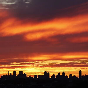 The evening sky is pictured during sunset over New York city