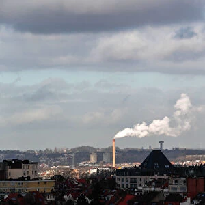 A factory chimney is seen in Brussels