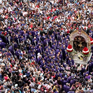 Faithful attend the procession of Senor de Los Milagros ( Lord of Miracles ), Peru s