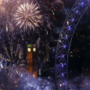 Fireworks explode beside the London Eye and The Houses of Parliament on the River Fireworks explode beside the London Eye and The Houses of Parliament on the River