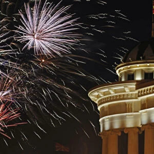 Fireworks explode near the Archeological museum in Skopjes central square during