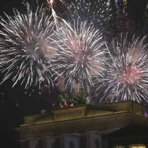 Fireworks explode next to the Quadriga sculpture atop the Brandenburg gate during Fireworks explode next to the Quadriga sculpture atop the Brandenburg gate during