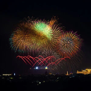 Fireworks explode over the town of Victoria on the Maltese island of Gozo during celebrations
