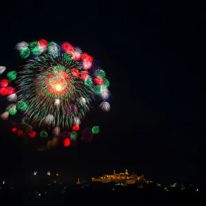 Fireworks explode over the town of Victoria on the Maltese island of Gozo during celebrations Fireworks explode over the town of Victoria on the Maltese island of Gozo during celebrations