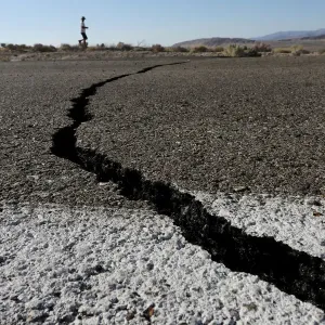 Fissures that opened up under a highway during a powerful earthquake that struck Southern