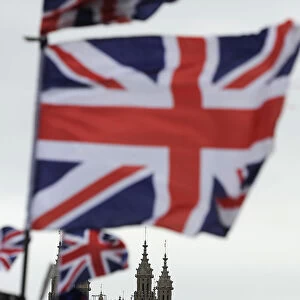 Flags are seen above a souvenir kiosk near Big Ben clock at the Houses of Parliament