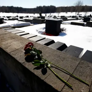 Flowers are seen at the World War Two memorial in the former village of Khatyn Flowers are seen at the World War Two memorial in the former village of Khatyn