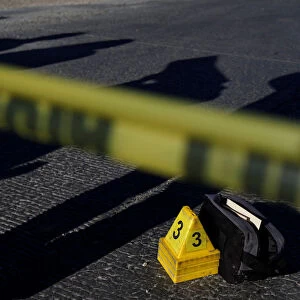 Forensic marks are seen on a crime scene, where two dead bodies were found