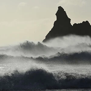 Gale force winds blow back the waves at Church Rock on Broad Haven Beach in Pembrokeshire