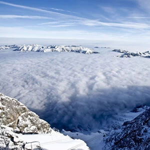 A general view from Germanys highest mountain the Zugspitze, shows fog covered mountain