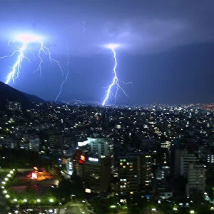 A GENERAL VIEW OF LIGHTENING STRIKING OVER THE CITY OF KOBE