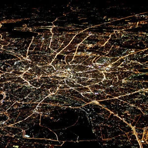 A general view of night Moscow is seen from the window of a passenger jet