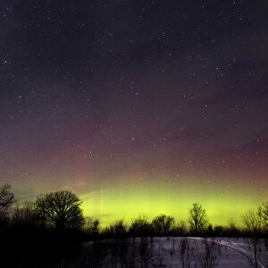 The glow of the Aurora Borealis, or Northern Lights, is seen in the horizon in Kawartha