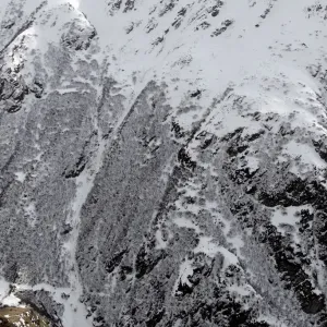 A helicopter conducts a search over the site of an avalanche near Bourg-St-Pierre A helicopter conducts a search over the site of an avalanche near Bourg-St-Pierre